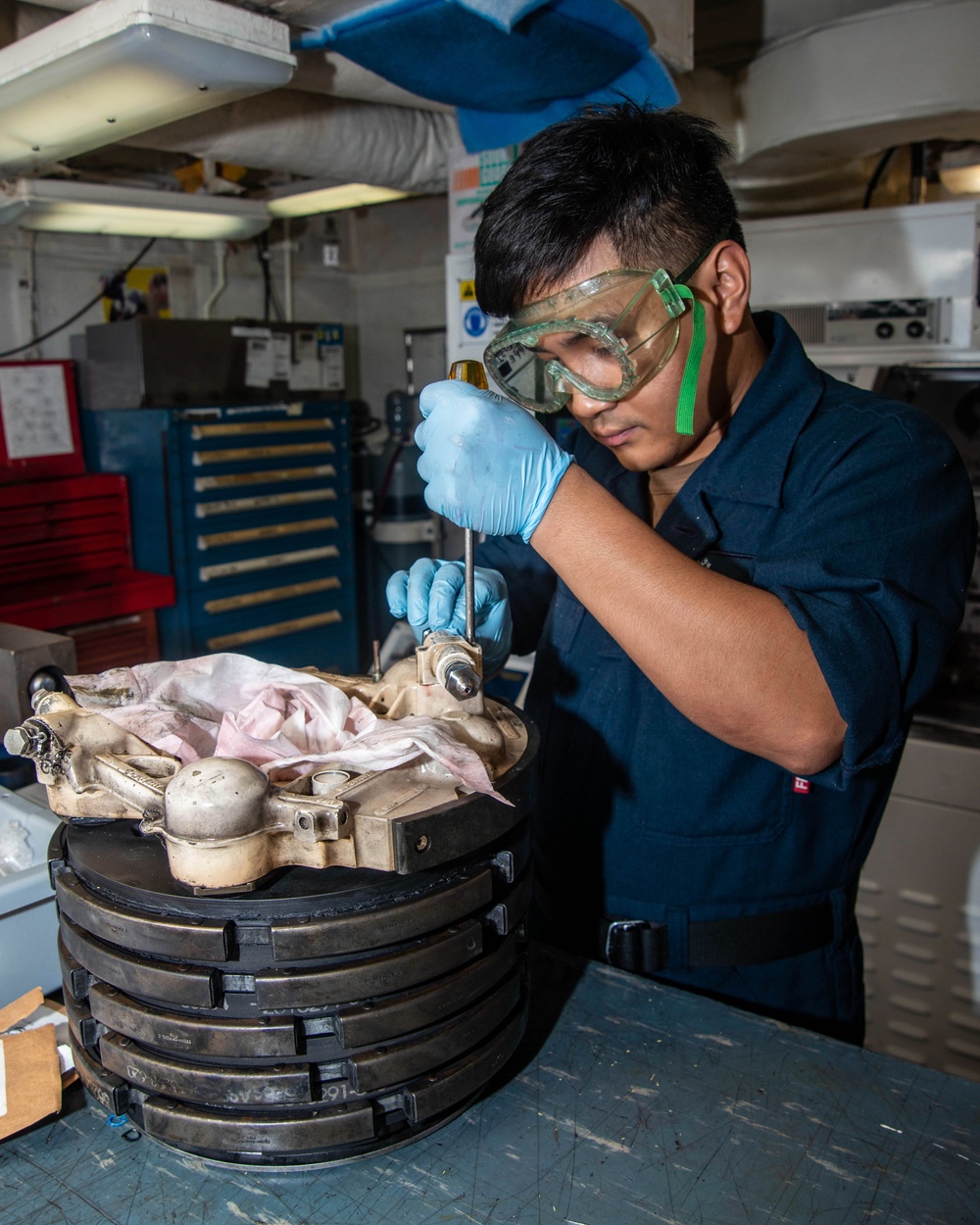 Sailor Reassembles Aircraft Brake