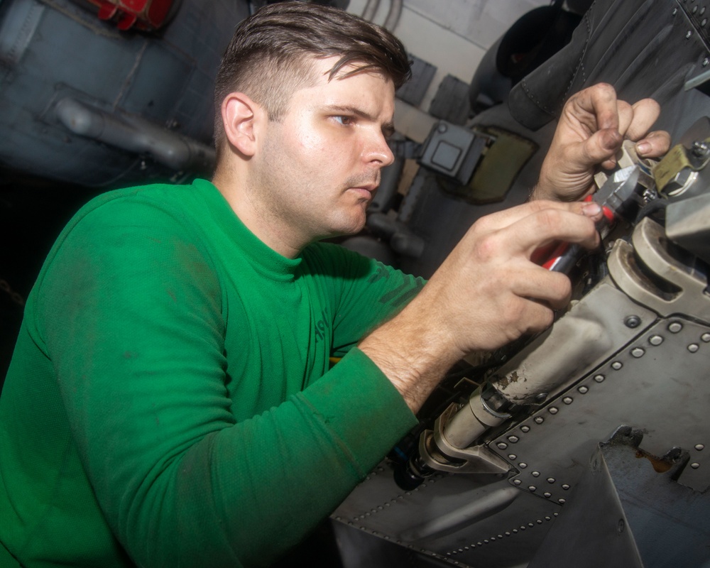 Sailor Reassembles Aircraft Brake