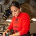 Sailor Disassembles Bomb Rack