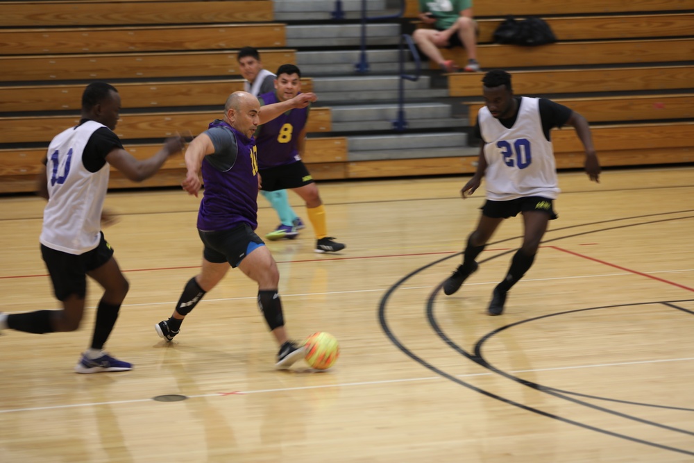 Soldiers unite on the indoor soccer battlefield in pursuit of the Commander's Cup