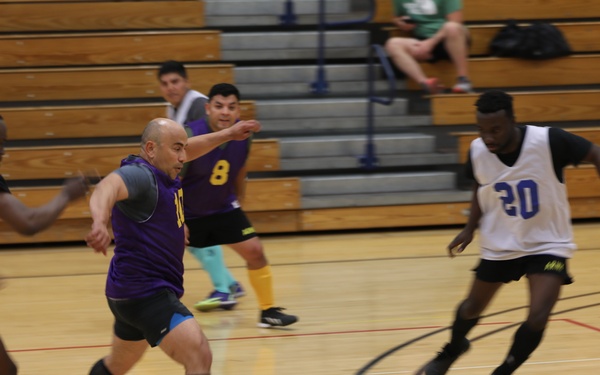 Soldiers unite on the indoor soccer battlefield in pursuit of the Commander's Cup