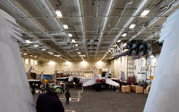 Sailors Conduct Aircraft Maintenance in USS Gerald R. Ford’s Hangar Bay
