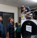 ESL Sailors TroubleShoot Charles King Fitness Center's Laundry Facilities
