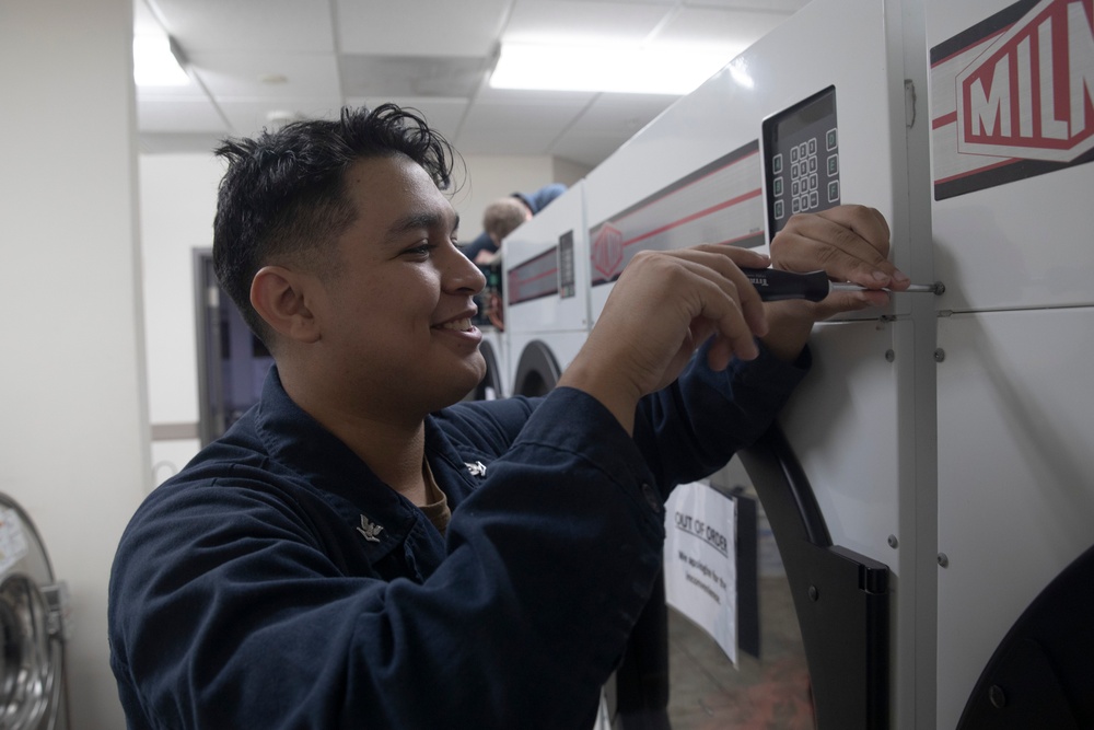 ESL Sailors TroubleShoot Charles King Fitness Center's Laundry Facilities