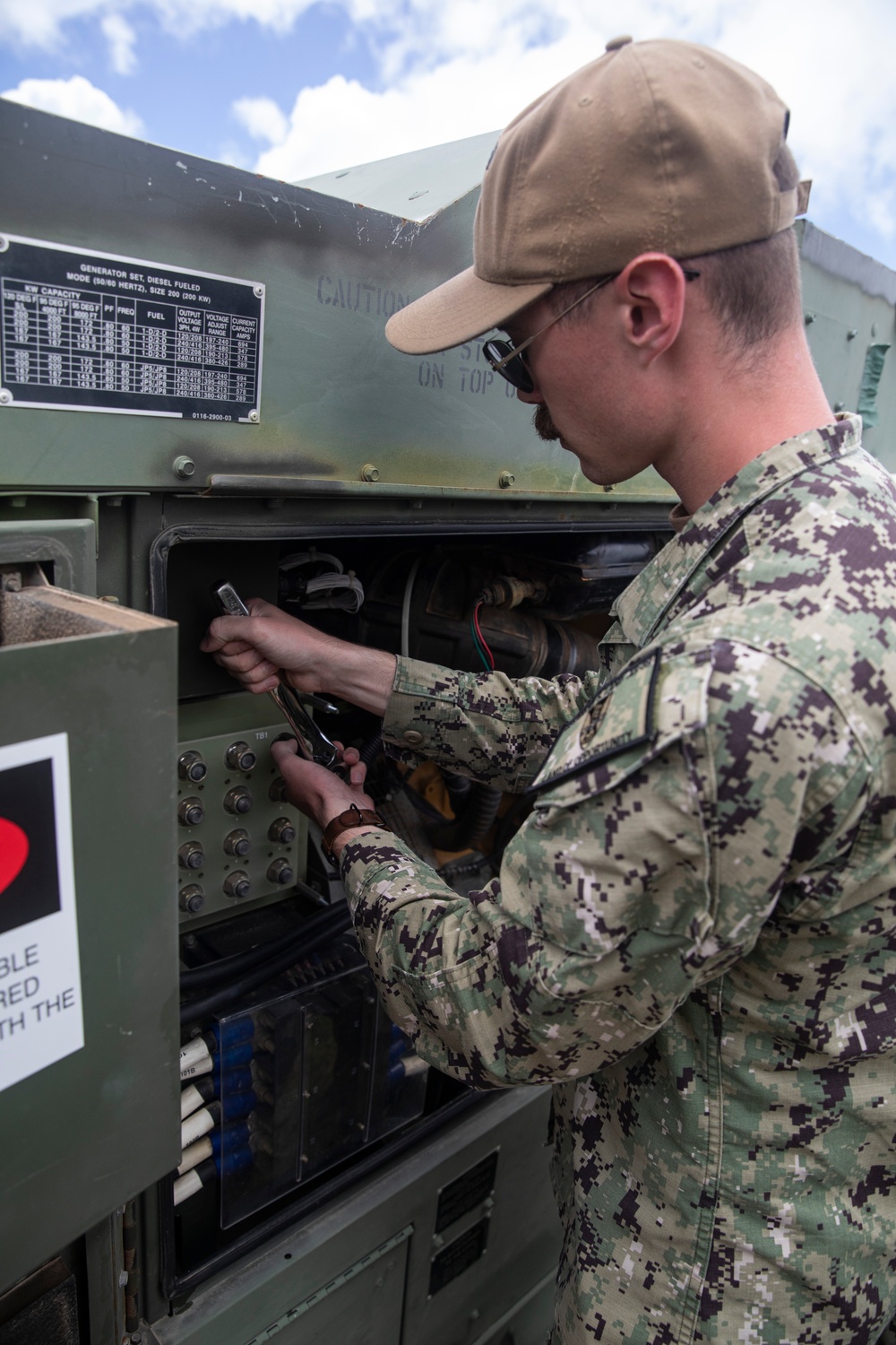 ESL Sailors Assist in Generator Repairs after Typhoon Mawar