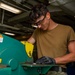 Sailor Uses a Universal Metal Worker Aboard Emory S. Land