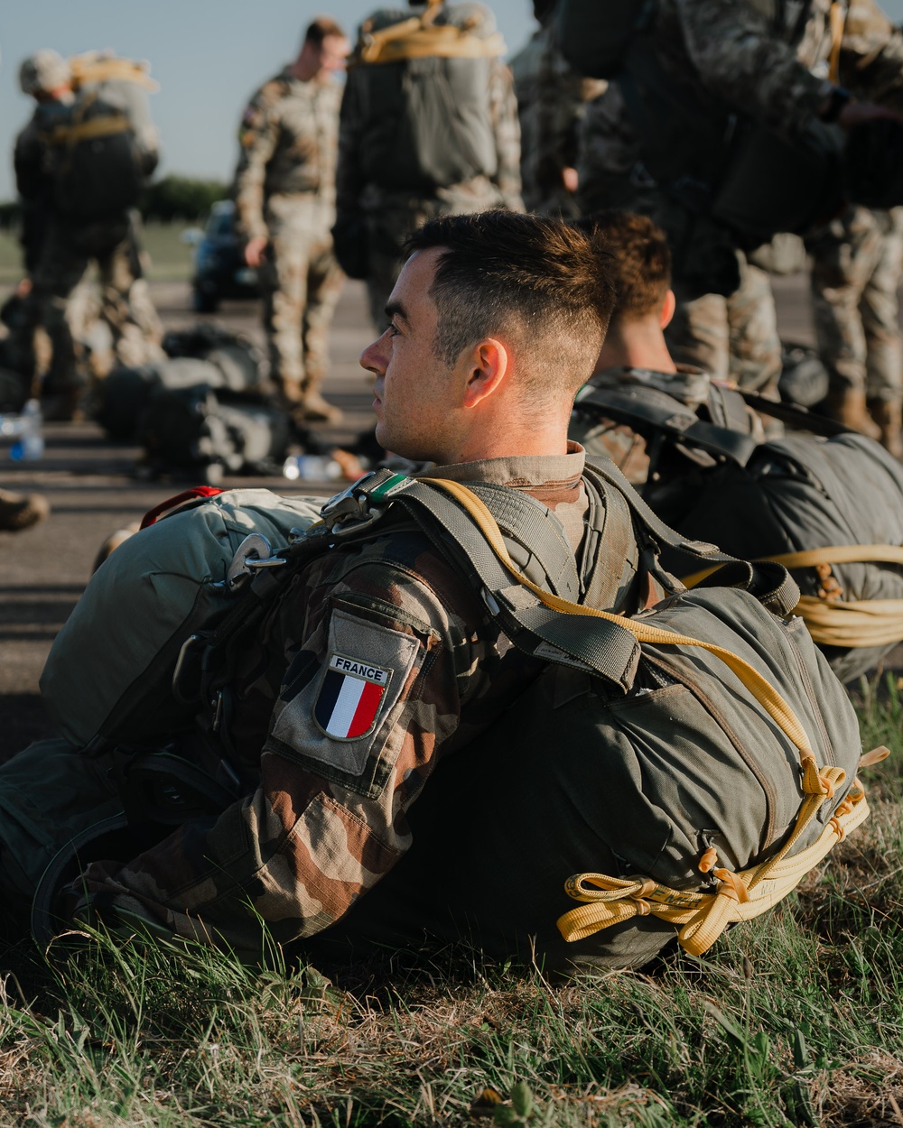 A French Paratrooper Ready To Board A C-130
