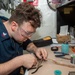 USS Ronald Reagan (CVN 76) Sailors repair components