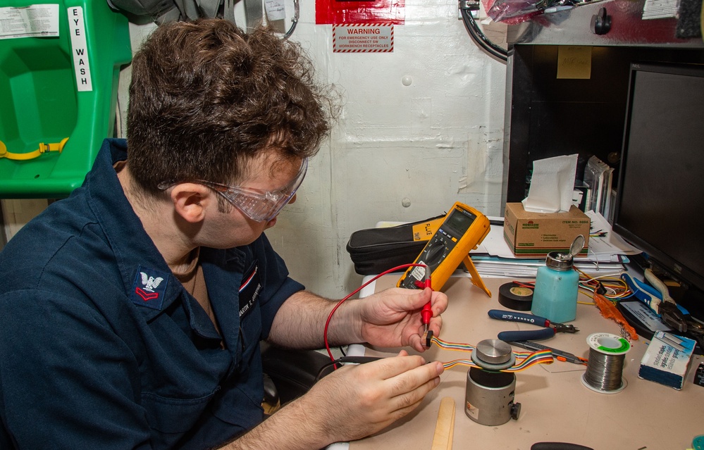 USS Ronald Reagan (CVN 76) Sailors repair components