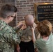 U.S. Navy Band holds E6 pinning ceremony for two Sailors