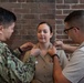 U.S. Navy Band holds E6 pinning ceremony for two Sailors