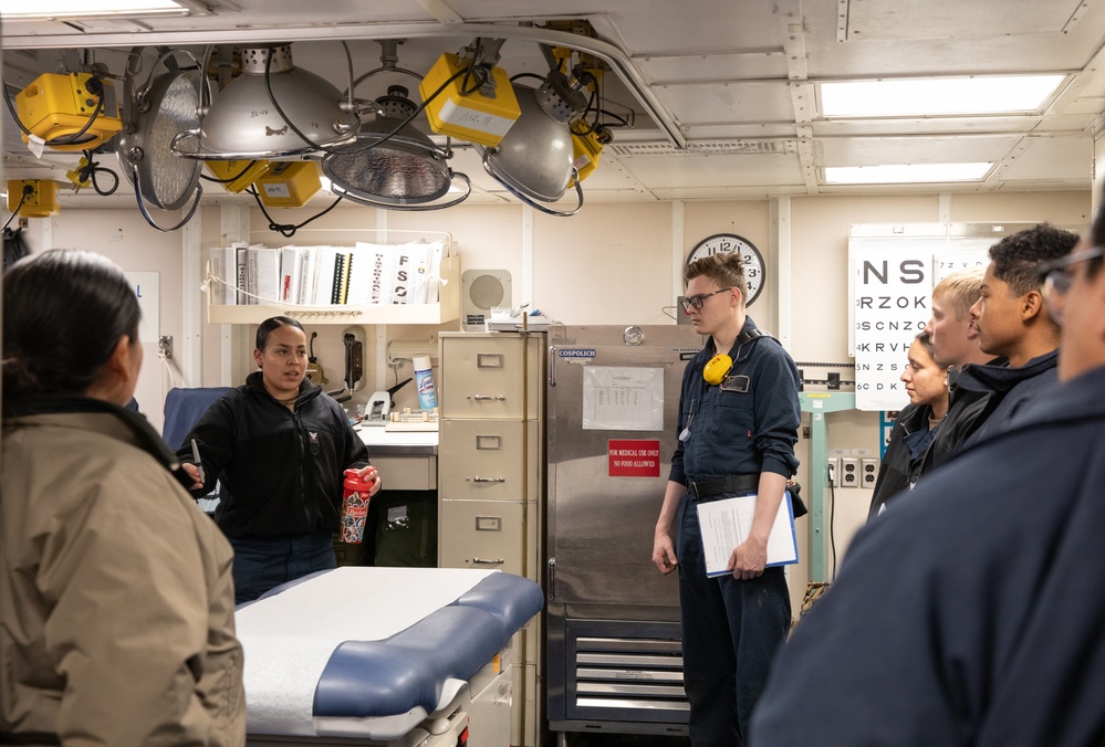 Hospital Corpsman 3rd Class Jennifer Artalejo gives stretcher bearer training