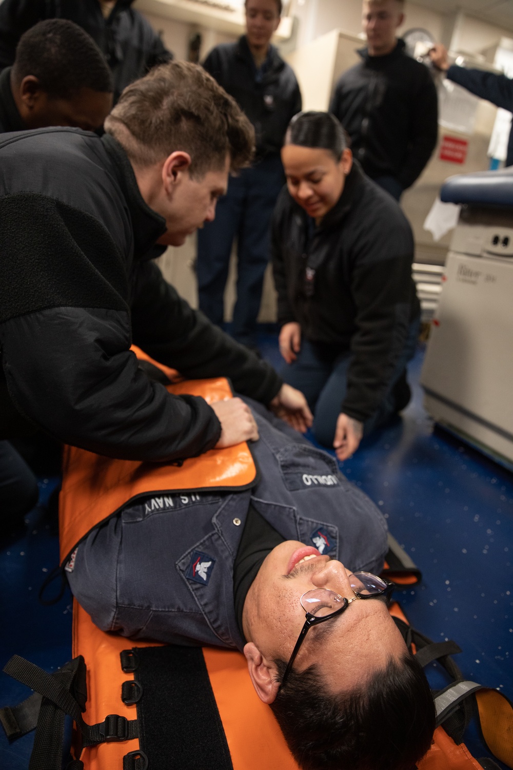 USS Harpers Ferry (LSD 49) sailors participate in stretcher bearer training