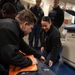 USS Harpers Ferry (LSD 49) sailors participate in stretcher bearer training