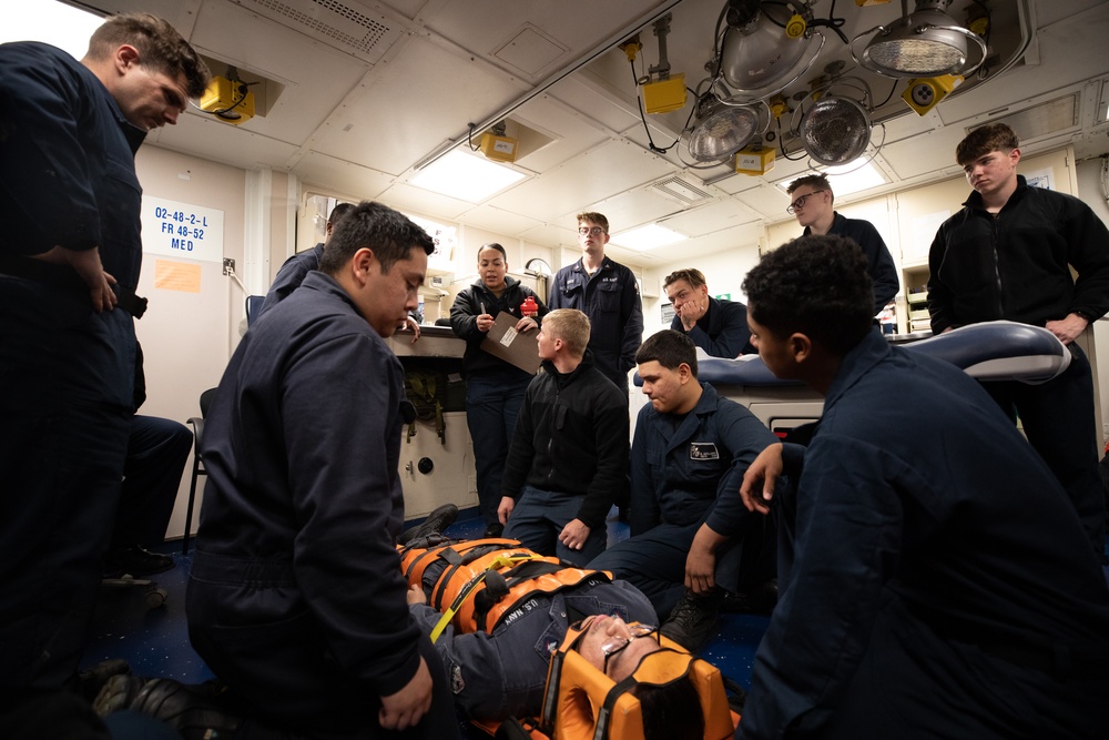 USS Harpers Ferry (LSD 49) sailors participate in stretcher bearer training