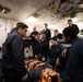 USS Harpers Ferry (LSD 49) sailors participate in stretcher bearer training