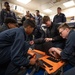 USS Harpers Ferry (LSD 49) sailors participate in stretcher bearer training