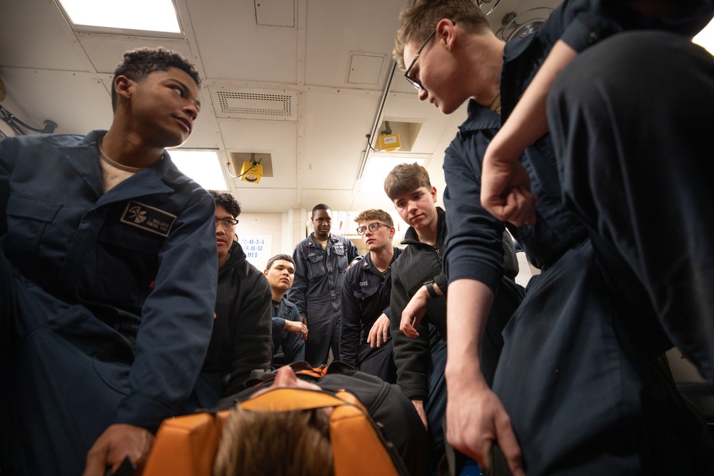 USS Harpers Ferry (LSD 49) sailors participate in stretcher bearer training