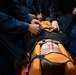 Boatswain's Mate Seaman Cale Hudson participates in stretcher bearer training