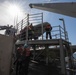 USS Harpers Ferry (LSD 49) sailors prepare to put rigid hull inflatable boat (RHIB) in Alaskan Gulf
