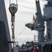 USS Harpers Ferry (LSD 49) sailors lower rigid hull inflatable boat (RHIB) into Alaskan Gulf
