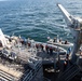 USS Harpers Ferry (LSD 49) sailors lower rigid hull inflatable boat (RHIB) into Alaskan Gulf