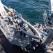 USS Harpers Ferry (LSD 49) sailors lower rigid hull inflatable boat (RHIB) into Alaskan Gulf