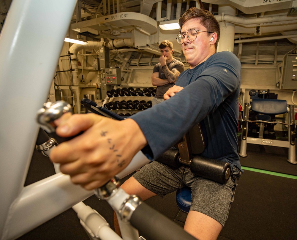 Fire Controlman (Aegis) 2nd Class Robert Clark Exercises on Row Machine