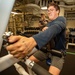 Fire Controlman (Aegis) 2nd Class Robert Clark Exercises on Row Machine