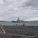 Arleigh Burke-class guided-missile destroyer USS Momsen (DDG 92) pulls into port at Homer, Alaska