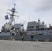 Arleigh Burke-class guided-missile destroyer USS Momsen (DDG 92) pulls into port at Homer, Alaska