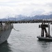 Arleigh Burke-class guided-missile destroyer USS Momsen (DDG 92) pulls into port at Homer, Alaska