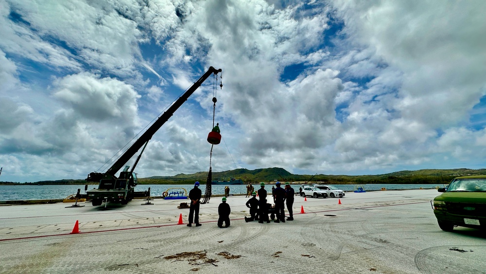 Joint team refloat and relocate aids to navigation in inner Apra Harbor