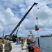 Joint team refloat and relocate aids to navigation in inner Apra Harbor