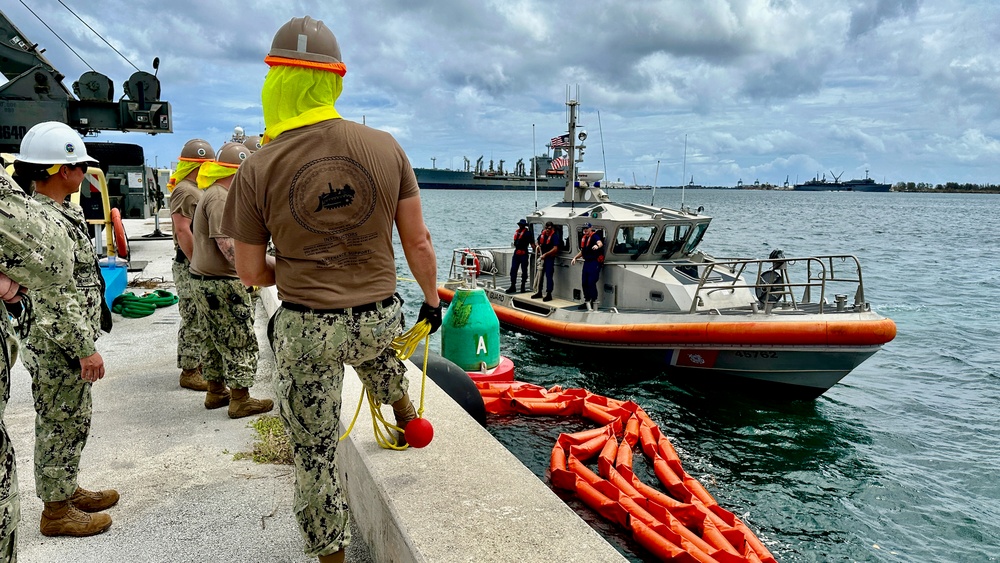 Joint team refloat and relocate aids to navigation in inner Apra Harbor