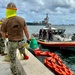 Joint team refloat and relocate aids to navigation in inner Apra Harbor