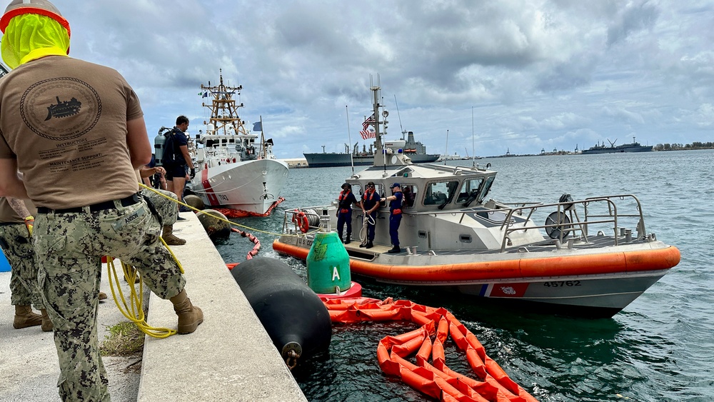 Joint team refloat and relocate aids to navigation in inner Apra Harbor