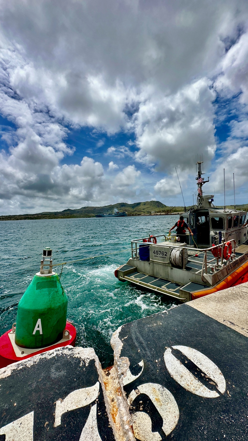 Joint team refloat and relocate aids to navigation in inner Apra Harbor