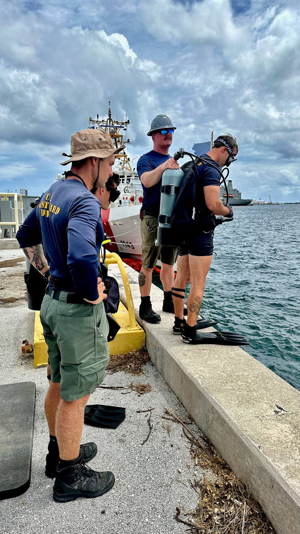 Joint team refloat and relocate aids to navigation in inner Apra Harbor