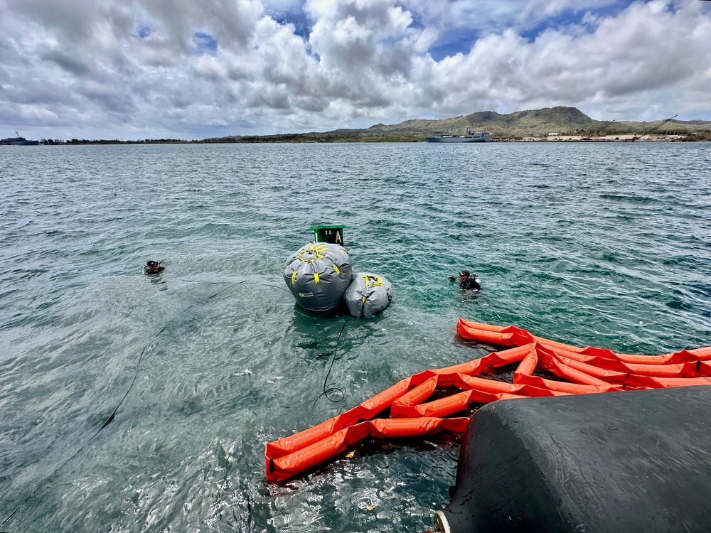 Joint team refloat and relocate aids to navigation in inner Apra Harbor