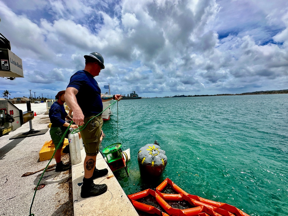 Joint team refloat and relocate aids to navigation in inner Apra Harbor