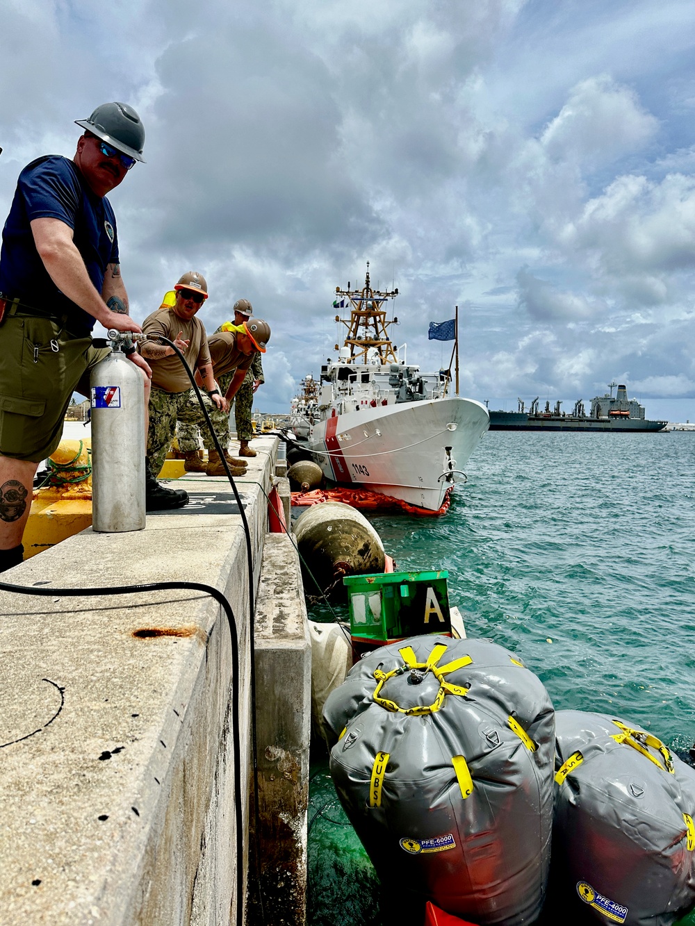 Joint team refloat and relocate aids to navigation in inner Apra Harbor