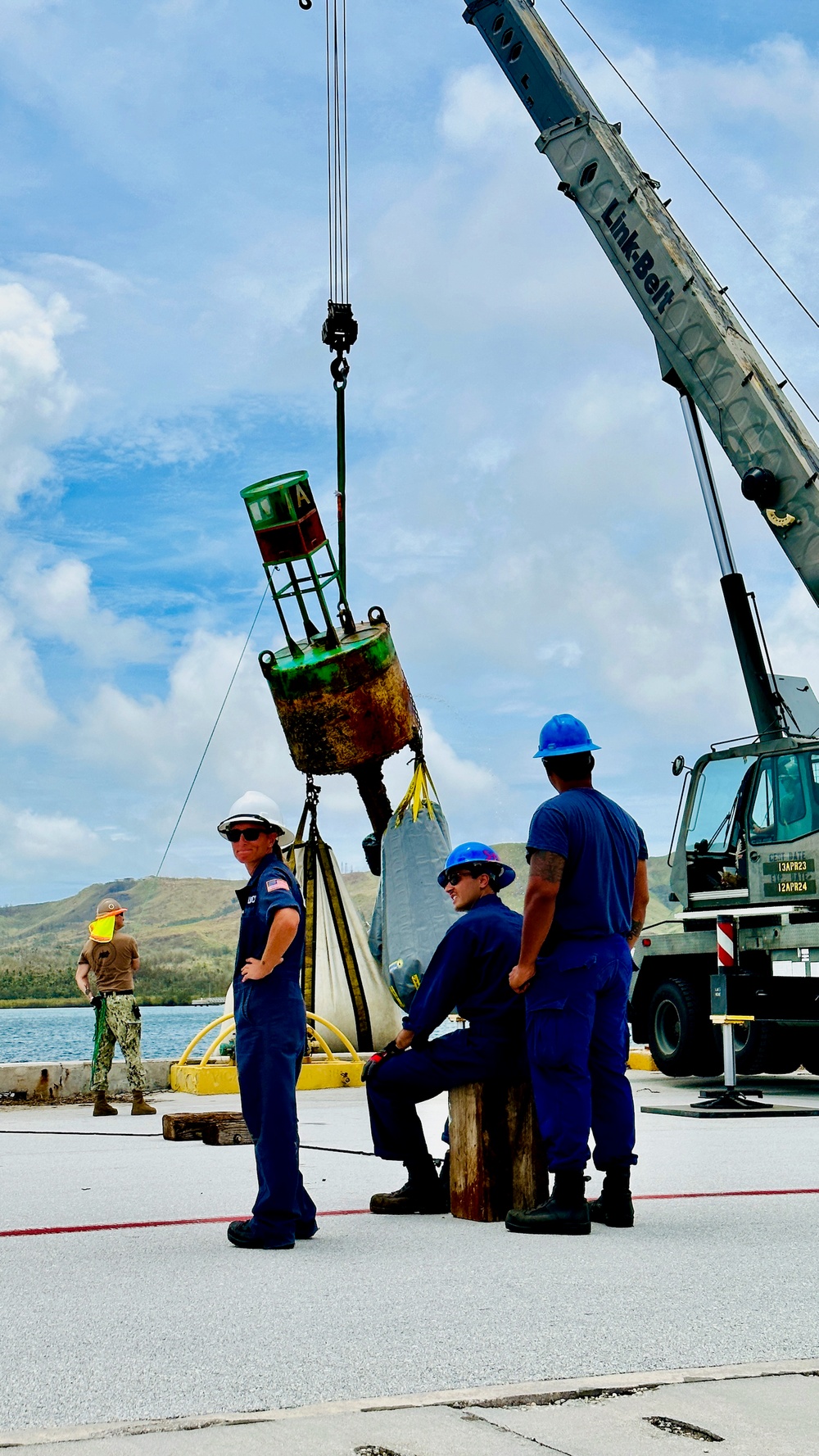 Joint team refloat and relocate aids to navigation in inner Apra Harbor