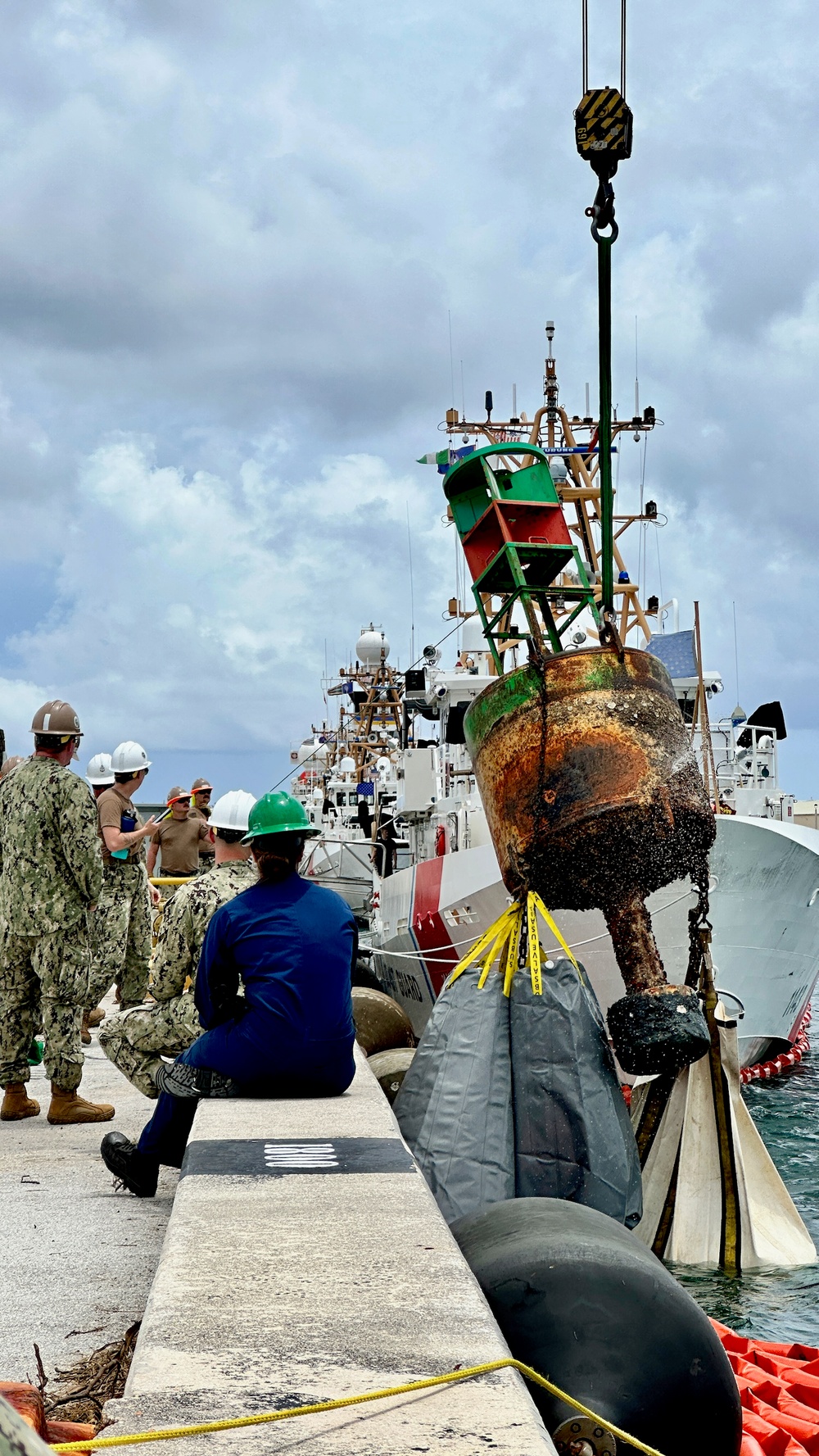 Joint team refloat and relocate aids to navigation in inner Apra Harbor