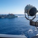 USS Ronald Reagan (CVN 76) conducts vertical replenishment (VERTREP) with USNS Wally Schirra