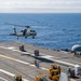 USS Ronald Reagan (CVN 76) conducts vertical replenishment (VERTREP) with USNS Wally Schirra