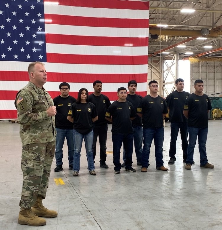 High school students enlist in Army during ceremony at depot