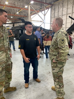 High school students enlist in Army during ceremony at depot
