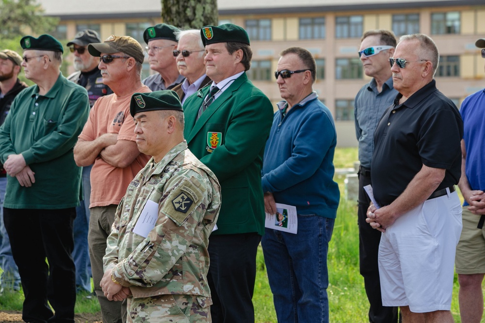 Attendees listen intently to the speakers at the ceremony for Gary Gordon