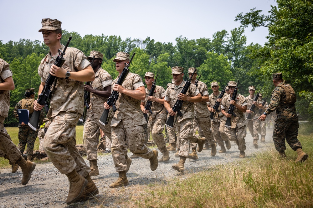 OCS Candidates Conduct the Fire Team Assault Course